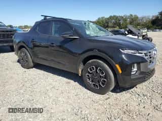 2023 Hyundai Santa Cruz SEL z VIN 5NTJC4AE1PH077035, wystawiony jako Copart lot #76773804 z przebiegiem 16 470 mil mil oraz Szkoda całkowita • Salvage title. Historia ofert i sprzedaży dostępna na DreamBid. Obrazek 4.