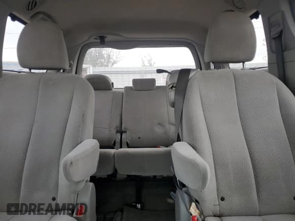 ✅ 2013 Toyota Sienna LE • VIN: 5TDKK3DC0DS351356 • Lot: 90577385. Wystawiony na Copart z przebiegiem 183 215 mil. Bezpłatny archiwum sprzedaży aukcyjnych z USA i szczegółowy raport historii pojazdu na DreamBid. Zdjęcie 10.