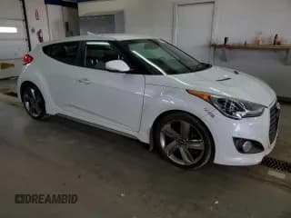 ✅ 2013 Hyundai Veloster Turbo • VIN: KMHTC6AEXDU169891 • Lot: 56524893. Listed on Copart with 124,726 mi. Free auction sales archive from the USA and detailed vehicle history report at DreamBid. Image 4.