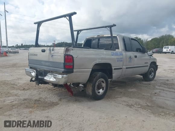 ✅ 1999 Dodge RAM • VIN: 3B7KC23W9XG138735 • Lot: 42829718. Listed on IAAI with 235,496 mi. Free auction sales archive from the USA and detailed vehicle history report at DreamBid. Image 4.