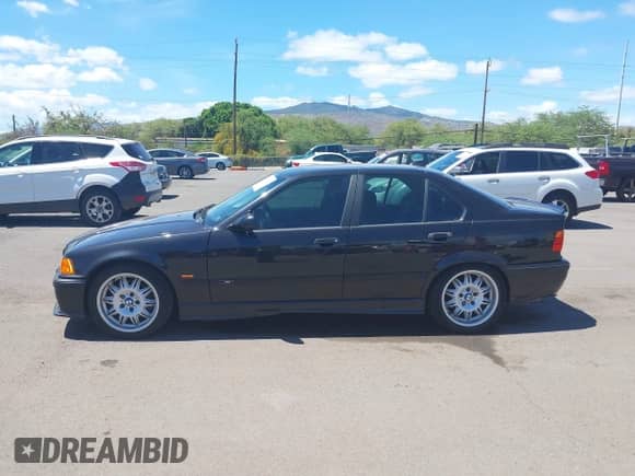 1997 BMW 3 Series M3s with VIN WBSCD932XVEE05100, listed as a IAAI auction lot 42715104 with 216,125 mi miles and . Bid and sale history available at DreamBid. Image 15.