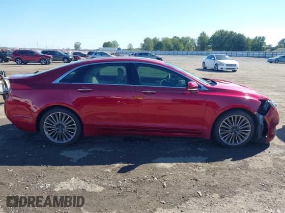 ✅ 2013 Lincoln MKZ • VIN: 3LN6L2G92DR813830 • Lot: 43419764. Wystawiony na IAAI z przebiegiem 123 578 mil. Bezpłatny archiwum sprzedaży aukcyjnych z USA i szczegółowy raport historii pojazdu na DreamBid. Zdjęcie 13.