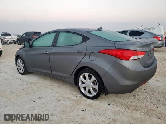 ✅ 2013 Hyundai Elantra GLS • VIN: 5NPDH4AE3DH400512 • Lot: 90545325. Listed on Copart with 133,258 mi. Free auction sales archive from the USA and detailed vehicle history report at DreamBid. Image 2.