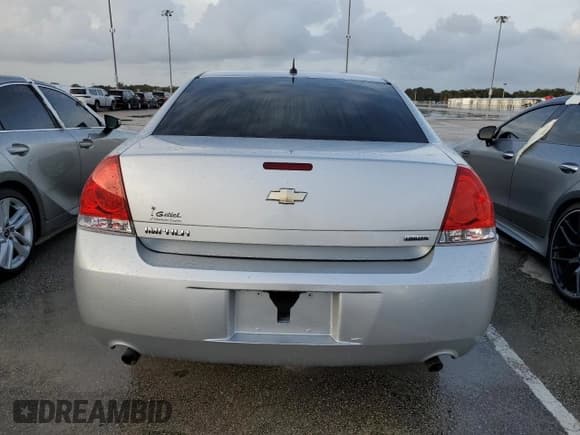 ✅ 2015 Chevrolet Impala LS • VIN: 2G1WA5E31F1133623 • Лот: 79618774. Опубликован ранее на Copart с пробегом Не указан. Бесплатный доступ к архиву аукционных продаж из США и подробный отчёт об истории автомобиля на DreamBid. Изображение 6.