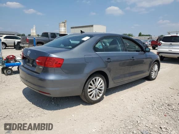 ✅ 2014 Volkswagen Jetta SEL • VIN: 3VWL17AJ7EM289468 • Lot: 67549345. Listed on Copart with 126,928 mi. Free auction sales archive from the USA and detailed vehicle history report at DreamBid. Image 3.