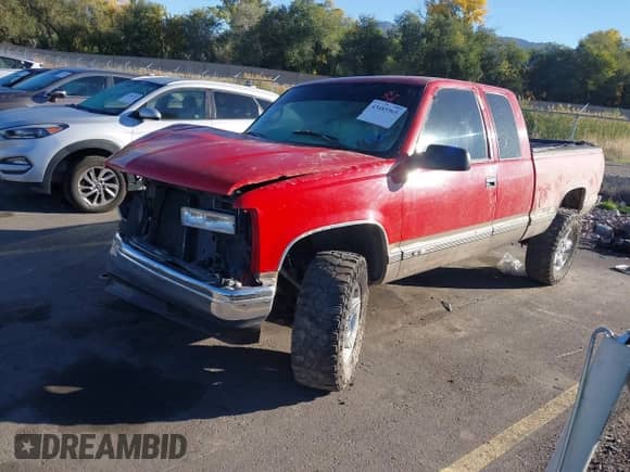 1997 Chevrolet Silverado 1500 z VIN 2GCEK19R5V1290268, wystawiony jako IAAI lot #43485965 z przebiegiem 192 915 mil mil oraz . Historia ofert i sprzedaży dostępna na DreamBid. Obrazek 2.