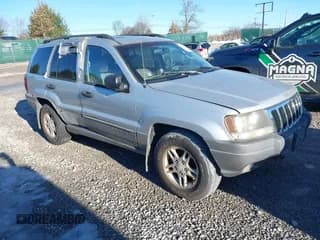 ✅ 2002 Jeep Grand Cherokee • VIN: 1J8GX48N12C255090 • Lot: 41450524. Listed on IAAI with 183,915 mi. Free auction sales archive from the USA and detailed vehicle history report at DreamBid. Image 1.