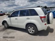 ✅ 2010 Suzuki Grand Vitara XSport • VIN: JS3TE0D43A4101038 • Lot: 64850675. Listed on Copart with 149,466 mi. Free auction sales archive from the USA and detailed vehicle history report at DreamBid. Image 2.