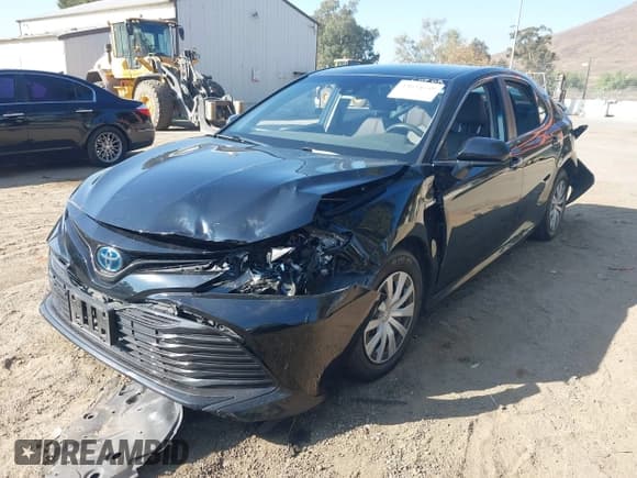 ✅ 2020 Toyota Camry Hybrid LE • VIN: 4T1C31AK6LU539970 • Lot: 43634548. Listed on IAAI with 126,677 mi. Free auction sales archive from the USA and detailed vehicle history report at DreamBid. Image 22.