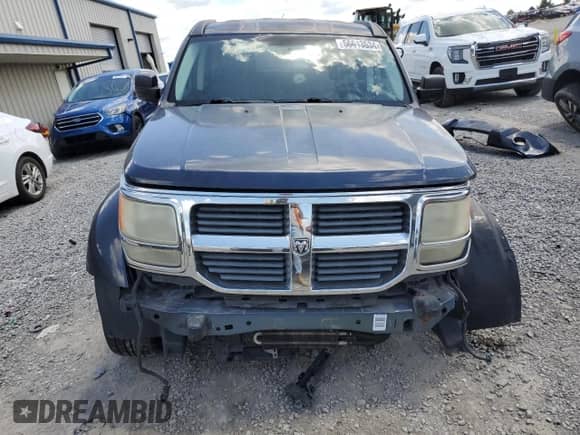 2008 Dodge Nitro SXT с VIN 1D8GU28K18W104754, выставлен на аукционе Copart как лот 56613534 с пробегом 176 716 миль миль и Списание • Salvage title. История ставок и продаж доступна на DreamBid. Изображение 5.