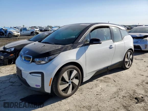 ✅ 2019 BMW i3 • VIN: WBY8P2C5XK7E02590 • Лот: 47802683. Опубликован ранее на Copart с пробегом 28 398 миль. Бесплатный доступ к архиву аукционных продаж из США и подробный отчёт об истории автомобиля на DreamBid. Изображение 1.