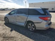 ✅ 2019 Honda Odyssey Touring • VIN: 5FNRL6H8XKB083758 • Lot: 82373125. Wystawiony na Copart z przebiegiem 96 448 mil. Bezpłatny archiwum sprzedaży aukcyjnych z USA i szczegółowy raport historii pojazdu na DreamBid. Zdjęcie 2.