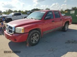 2005 Dodge Dakota SLT с VIN 1D7HW48N75S102468, выставлен на аукционе Copart как лот 70258155 с пробегом 125 307 миль миль и Списание • Salvage title. История ставок и продаж доступна на DreamBid. Изображение 1.