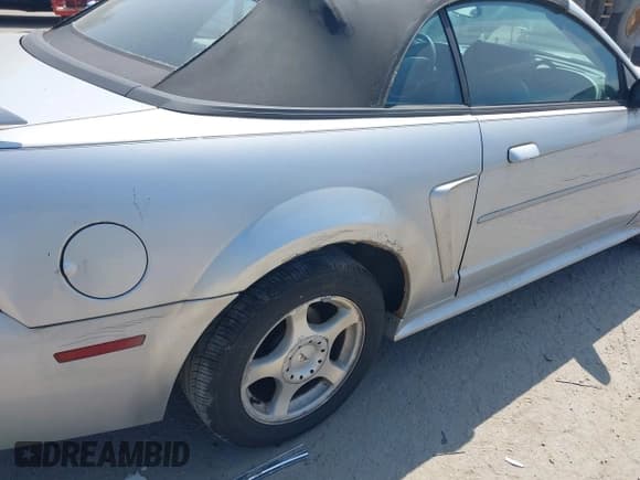 ✅ 2004 Ford Mustang Deluxe • VIN: 1FAFP44604F201689 • Lot: 42943708. Listed on IAAI with 144,523 mi. Free auction sales archive from the USA and detailed vehicle history report at DreamBid. Image 6.