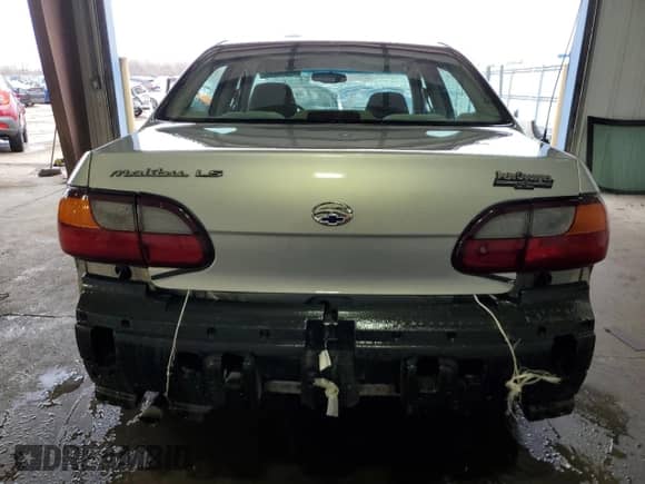 2000 Chevrolet Malibu LS z VIN 1G1NE52J4Y6106544, wystawiony jako Copart lot #42639405 z przebiegiem 167 734 mil mil oraz Szkoda całkowita • Salvage title. Historia ofert i sprzedaży dostępna na DreamBid. Obrazek 6.