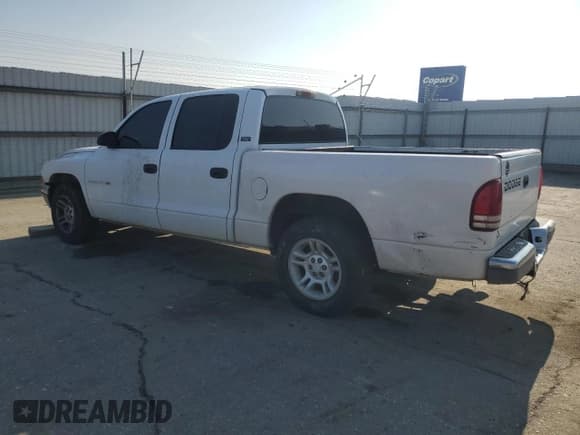 ✅ 2001 Dodge Dakota Sport • VIN: 1B7GL2AN61S106759 • Lot: 87423404. Wystawiony na Copart z przebiegiem 300 360 mil. Bezpłatny archiwum sprzedaży aukcyjnych z USA i szczegółowy raport historii pojazdu na DreamBid. Zdjęcie 2.