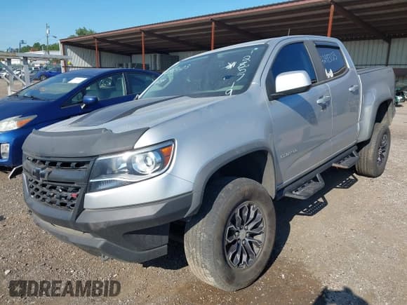 ✅ 2018 Chevrolet Colorado 4WD ZR2 • VIN: 1GCGTEEN9J1285719 • Лот: 42983123. Опубликован ранее на IAAI с пробегом 157 118 миль. Бесплатный доступ к архиву аукционных продаж из США и подробный отчёт об истории автомобиля на DreamBid. Изображение 2.