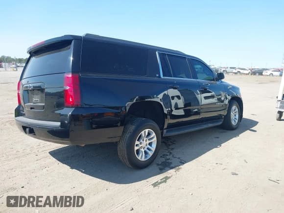 ✅ 2020 Chevrolet Suburban LT • VIN: 1GNSCHKC5LR102083 • Lot: 40551013. Wystawiony na IAAI z przebiegiem 105 555 mil. Bezpłatny archiwum sprzedaży aukcyjnych z USA i szczegółowy raport historii pojazdu na DreamBid. Zdjęcie 4.