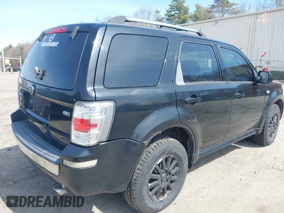 2009 Mercury Mariner Premier with VIN 4M2CU97799KJ04510, listed as a IAAI auction lot 41943965 with 190,929 mi miles and . Bid and sale history available at DreamBid. Image 4.