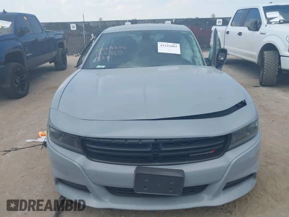 2022 Dodge Charger SXT with VIN 2C3CDXBG3NH216310, listed as a IAAI auction lot 43225885 with 81,885 mi miles and . Bid and sale history available at DreamBid. Image 12.