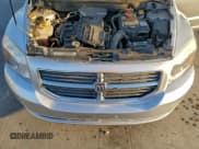 ✅ 2012 Dodge Caliber SXT • VIN: 1C3CDWDA9CD535837 • Лот: 92117905. Опубликован ранее на Copart с пробегом 150 512 миль. Бесплатный доступ к архиву аукционных продаж из США и подробный отчёт об истории автомобиля на DreamBid. Изображение 11.