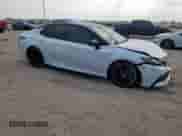 2021 Toyota Camry Hybrid XSE с VIN 4T1K31AK0MU026419, выставлен на аукционе Copart как лот 81029735 с пробегом 153 313 миль миль и Списание • Salvage title. История ставок и продаж доступна на DreamBid. Изображение 4.