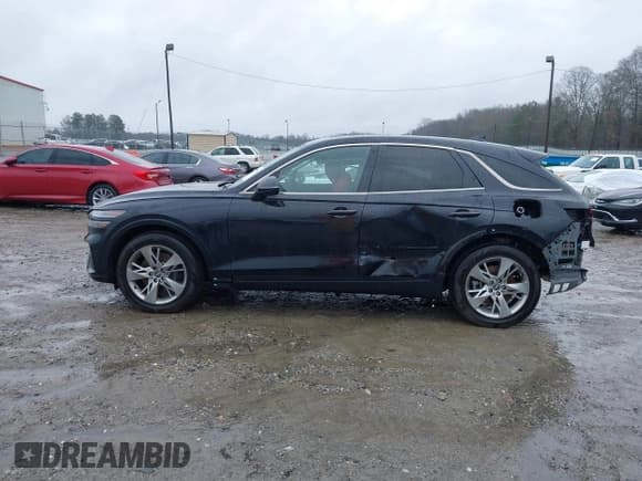 ✅ 2022 Genesis GV70 Sport • VIN: KMUMCDTC0NU018758 • Lot: 41735229. Listed on IAAI with 42,717 mi. Free auction sales archive from the USA and detailed vehicle history report at DreamBid. Image 6.