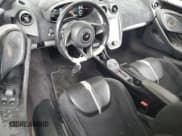 ✅ 2017 McLaren 570S • VIN: SBM13DAA7HW003763 • Lot: 57582895. Listed on Copart with 43,165 mi. Free auction sales archive from the USA and detailed vehicle history report at DreamBid. Image 8.