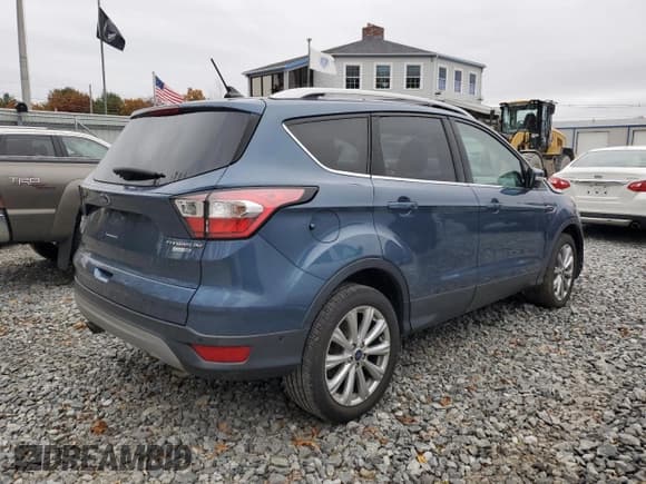 ✅ 2018 Ford Escape Titanium • VIN: 1FMCU9J92JUB01162 • Lot: 90094025. Wystawiony na Copart z przebiegiem Nie podano. Bezpłatny archiwum sprzedaży aukcyjnych z USA i szczegółowy raport historii pojazdu na DreamBid. Zdjęcie 3.