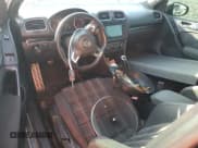 ✅ 2012 Volkswagen Golf GTI w/Conv & Sunroof • VIN: WVWEV7AJ7CW103263 • Lot: 65936695. Listed on Copart with 184,316 mi. Free auction sales archive from the USA and detailed vehicle history report at DreamBid. Image 8.