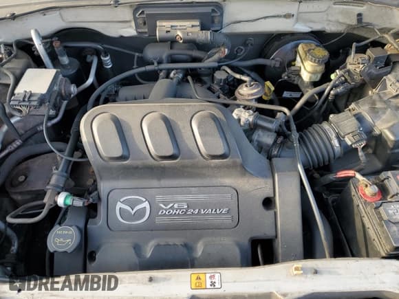 ✅ 2004 Mazda Tribute LX • VIN: 4F2YZ041X4KM19026 • Lot: 89388555. Listed on Copart with Not provided. Free auction sales archive from the USA and detailed vehicle history report at DreamBid. Image 12.
