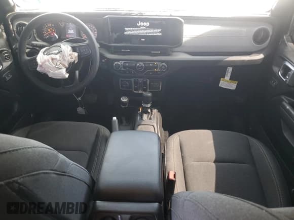 ✅ 2024 Jeep Gladiator Sport S • VIN: 1C6HJTAG6RL115721 • Лот: 43509515. Опубликован ранее на Copart с пробегом 32 111 миль. Бесплатный доступ к архиву аукционных продаж из США и подробный отчёт об истории автомобиля на DreamBid. Изображение 8.