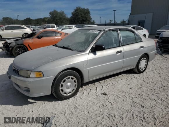 ✅ 2001 Mitsubishi Mirage ES • VIN: JA3AY26CX1U030593 • Lot: 83749264. Listed on Copart with 107,641 mi. Free auction sales archive from the USA and detailed vehicle history report at DreamBid. Image 1.