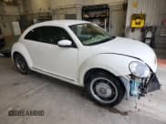 ✅ 2013 Volkswagen Beetle 2.5L • VIN: 3VWJX7AT1DM632703 • Lot: 92857275. Listed on Copart with 144,477 mi. Free auction sales archive from the USA and detailed vehicle history report at DreamBid. Image 4.