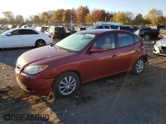 2010 Hyundai Elantra GLS z VIN KMHDU4ADXAU156633, wystawiony jako Copart lot #77080374 z przebiegiem 187 320 mil mil oraz Szkoda całkowita • Salvage title. Historia ofert i sprzedaży dostępna na DreamBid. Obrazek 1.