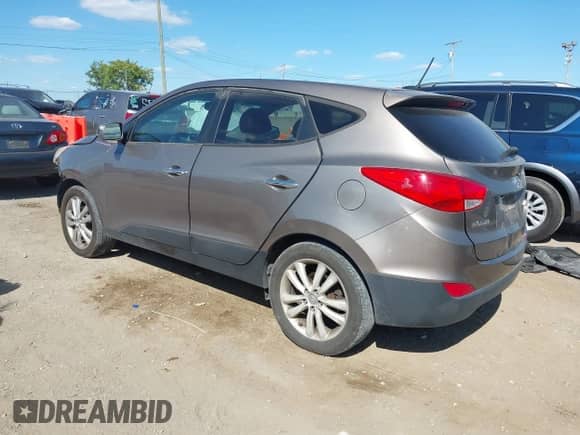 ✅ 2011 Hyundai Tucson Limited • VIN: KM8JUCAC3BU192055 • Lot: 43063727. Listed on IAAI with 214,573 mi. Free auction sales archive from the USA and detailed vehicle history report at DreamBid. Image 3.