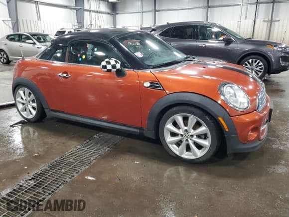 ✅ 2012 MINI Coupe • VIN: WMWSX1C53CT163839 • Лот: 51333995. Опубликован ранее на Copart с пробегом 118 324 миль. Бесплатный доступ к архиву аукционных продаж из США и подробный отчёт об истории автомобиля на DreamBid. Изображение 4.