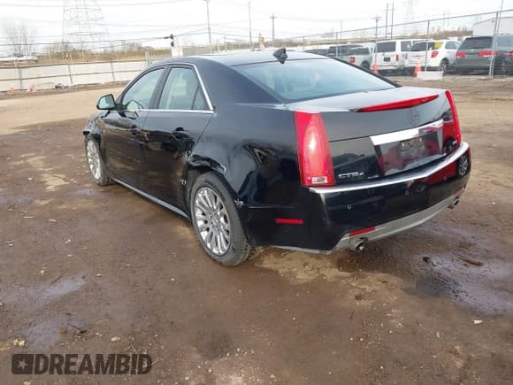 ✅ 2011 Cadillac CTS Premium • VIN: 1G6DS5ED7B0101210 • Lot: 41802027. Listed on IAAI with 127,701 mi. Free auction sales archive from the USA and detailed vehicle history report at DreamBid. Image 3.