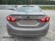 ✅ 2018 Chevrolet Cruze LT • VIN: 1G1BE5SMXJ7246580 • Lot: 81863505. Listed on Copart with 93,506 mi. Free auction sales archive from the USA and detailed vehicle history report at DreamBid. Image 6.