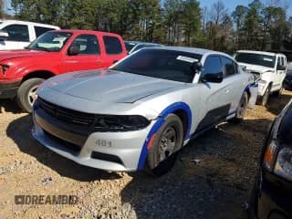✅ 2023 Dodge Charger Police • VIN: 2C3CDXAT5PH543101 • Lot: 84604805. Wystawiony na Copart z przebiegiem 27 717 mil. Bezpłatny archiwum sprzedaży aukcyjnych z USA i szczegółowy raport historii pojazdu na DreamBid. Zdjęcie 1.