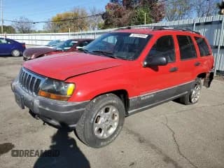 ✅ 2000 Jeep Grand Cherokee Laredo • VIN: 1J4GW48S1YC214915 • Lot: 82728995. Listed on Copart with 111,305 mi. Free auction sales archive from the USA and detailed vehicle history report at DreamBid. Image 1.