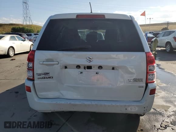 ✅ 2012 Suzuki Grand Vitara Premium • VIN: JS3TD0D64C4100245 • Lot: 71365134. Wystawiony na Copart z przebiegiem 100 501 mil. Bezpłatny archiwum sprzedaży aukcyjnych z USA i szczegółowy raport historii pojazdu na DreamBid. Zdjęcie 6.