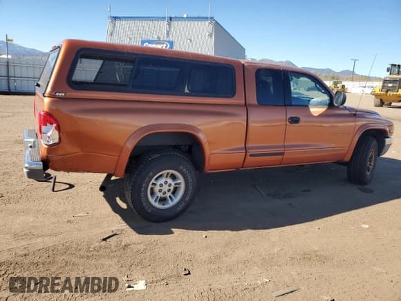 ✅ 2000 Dodge Dakota Sport • VIN: 1B7GG22NXYS641543 • Lot: 79862634. Wystawiony na Copart z przebiegiem 224 750 mil. Bezpłatny archiwum sprzedaży aukcyjnych z USA i szczegółowy raport historii pojazdu na DreamBid. Zdjęcie 3.