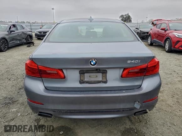 ✅ 2018 BMW 5 Series 540i • VIN: WBAJE5C50JWA94406 • Lot: 95793185. Wystawiony na Copart z przebiegiem 112 783 mil. Bezpłatny archiwum sprzedaży aukcyjnych z USA i szczegółowy raport historii pojazdu na DreamBid. Zdjęcie 6.