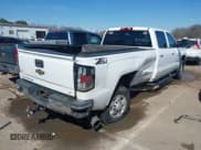 ✅ 2015 Chevrolet Silverado 2500HD LT • VIN: 1GC1KVE86FF520235 • Lot: 41664064. Listed on IAAI with 235,288 mi. Free auction sales archive from the USA and detailed vehicle history report at DreamBid. Image 4.