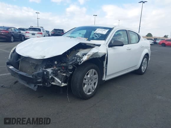 ✅ 2014 Dodge Avenger SE • VIN: 1C3CDZAB8EN215713 • Лот: 41352986. Опубликован ранее на IAAI с пробегом 119 201 миль. Бесплатный доступ к архиву аукционных продаж из США и подробный отчёт об истории автомобиля на DreamBid. Изображение 2.