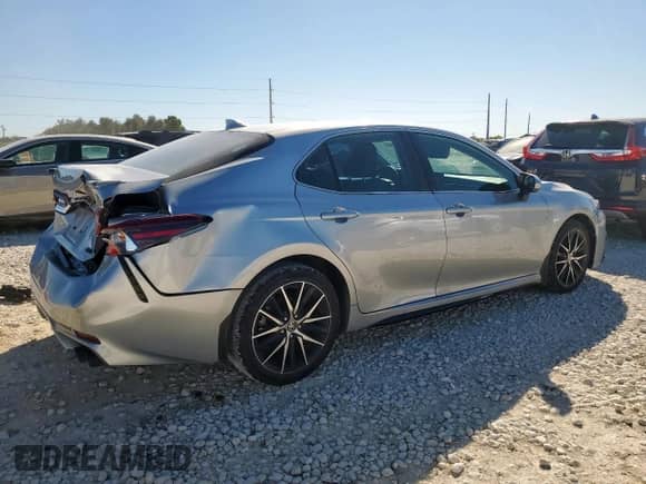 2024 Toyota Camry SE with VIN 4T1G11AK0RU882869, listed as a Copart auction lot 91041585 with 29,222 mi miles and Salvage title. Bid and sale history available at DreamBid. Image 3.