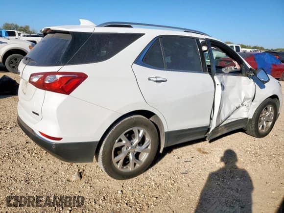 ✅ 2018 Chevrolet Equinox Premier • VIN: 3GNAXMEV0JS565104 • Lot: 90995305. Listed on Copart with 99,082 mi. Free auction sales archive from the USA and detailed vehicle history report at DreamBid. Image 3.
