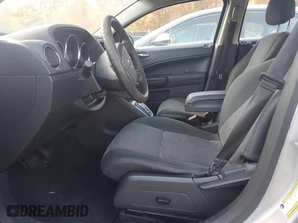 2011 Dodge Caliber Mainstreet with VIN 1B3CB3HA3BD123701, listed as a Copart auction lot 90858485 with 172,631 mi miles and Salvage title. Bid and sale history available at DreamBid. Image 7.