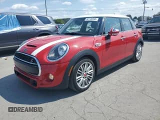 ✅ 2019 MINI Hardtop 4 Door Cooper S • VIN: WMWXU3C5XK2L13637 • Lot: 80148345. Listed on Copart with 40,644 mi. Free auction sales archive from the USA and detailed vehicle history report at DreamBid. Image 1.
